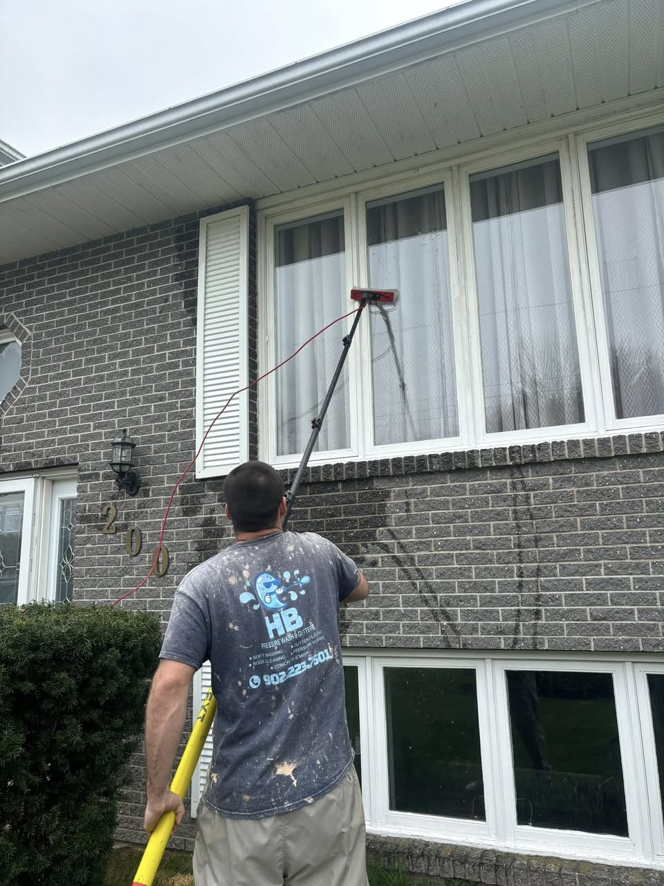 Professional pressure washing residential siding in Nova Scotia